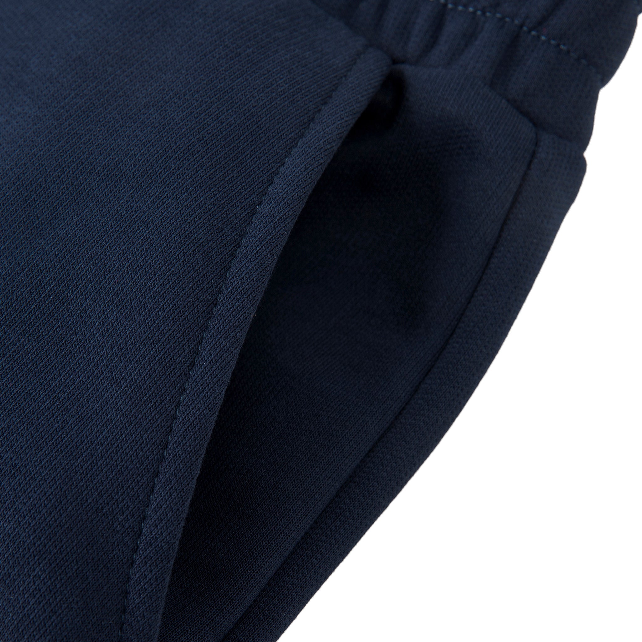 Close-up of a navy blue fabric texture on a white background