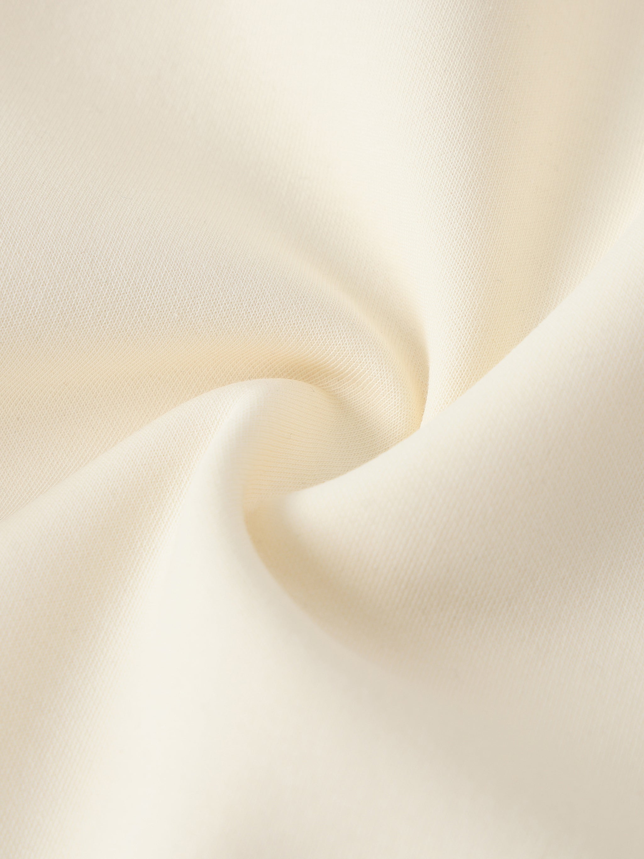 Close-up of beige fabric with a soft texture