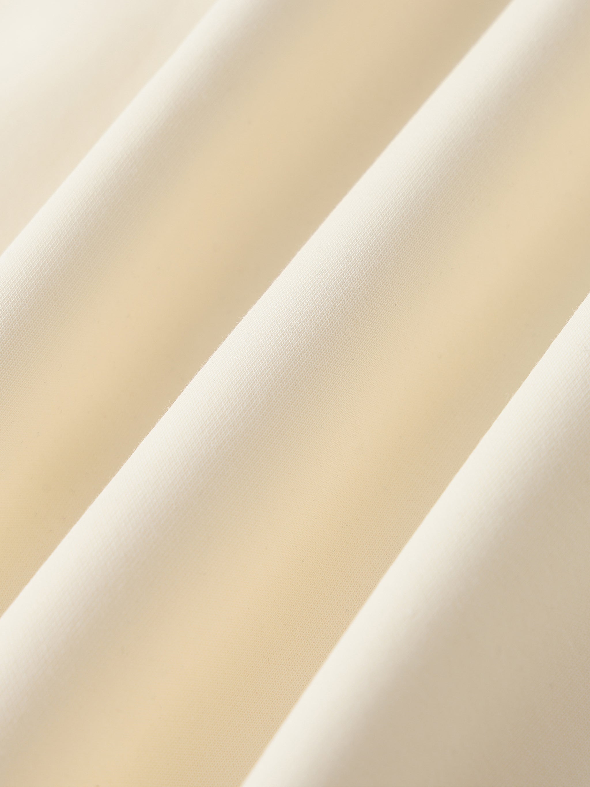 Close-up of beige fabric swatches with different textures