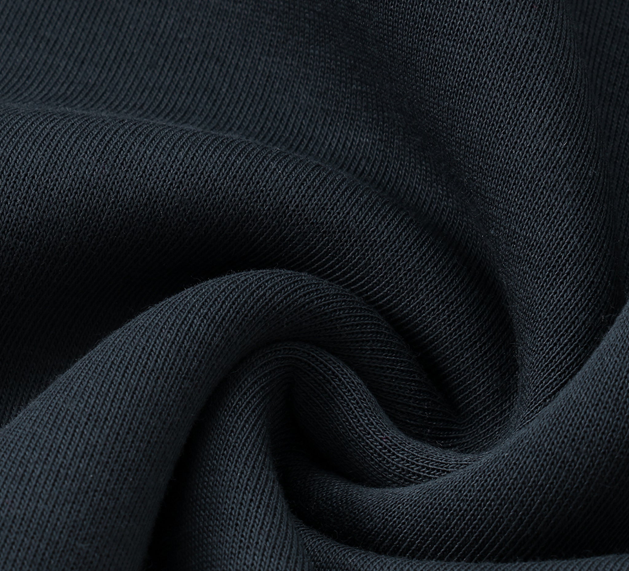 Close-up of dark blue fabric with visible texture