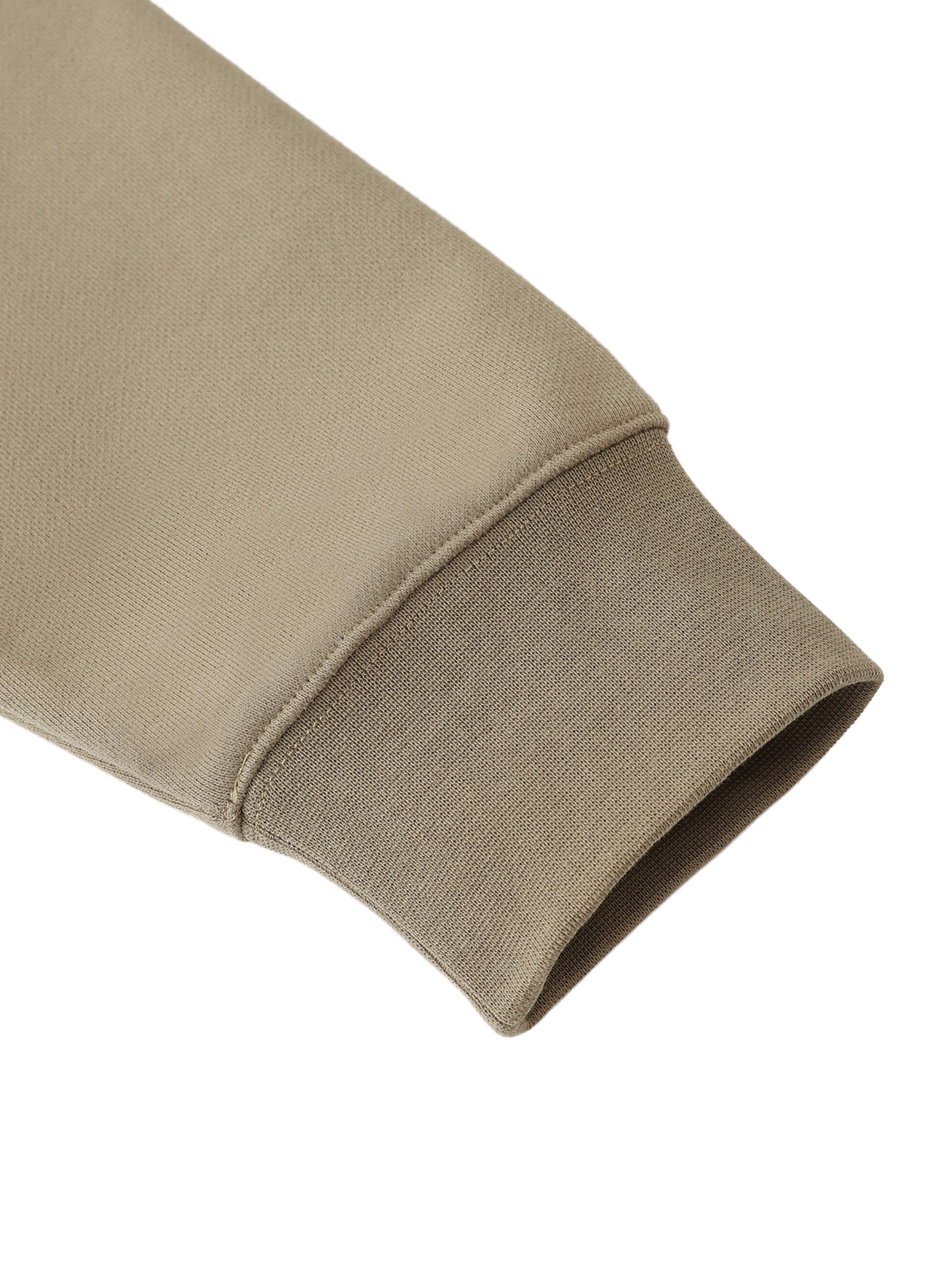 Close-up of a beige fabric sleeve on a white background