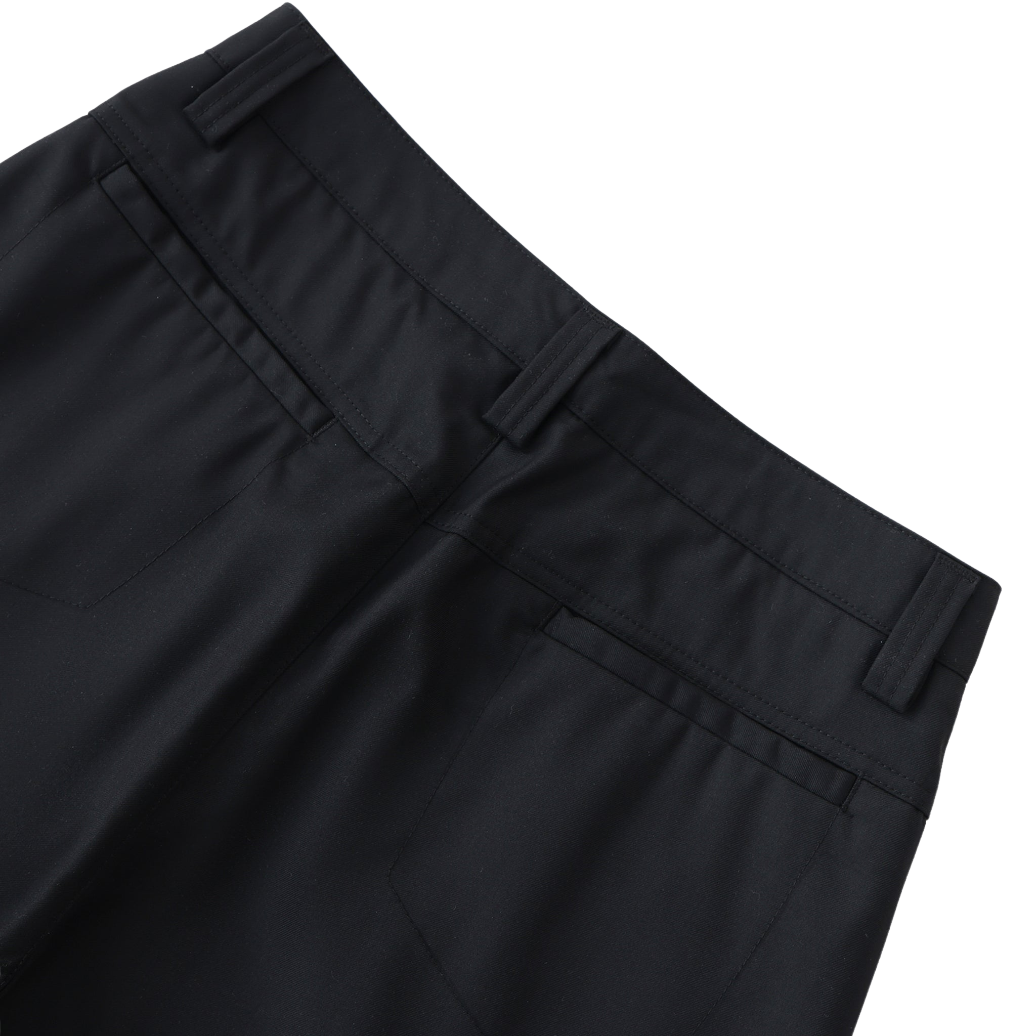 Close-up of black pants on a white background
