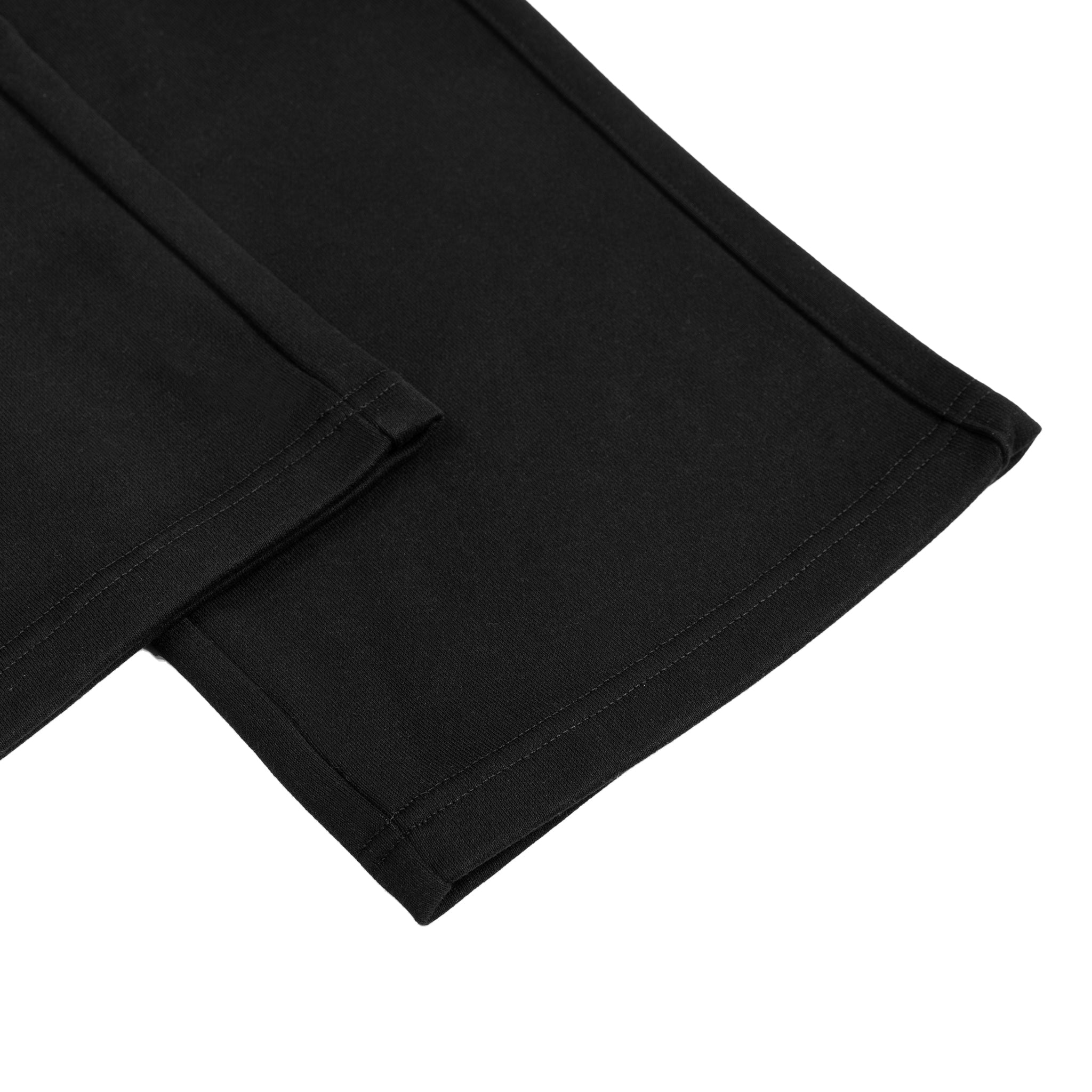 Close-up of a black fabric texture on a white background