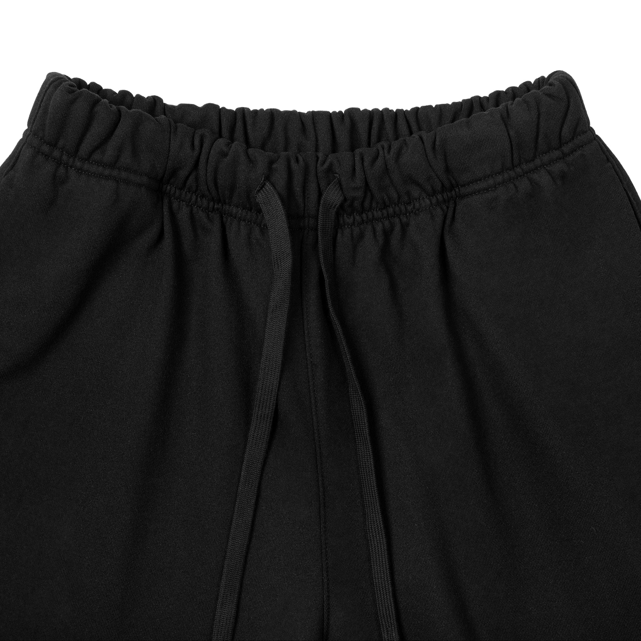 Black pants with an elastic waistband on a white background