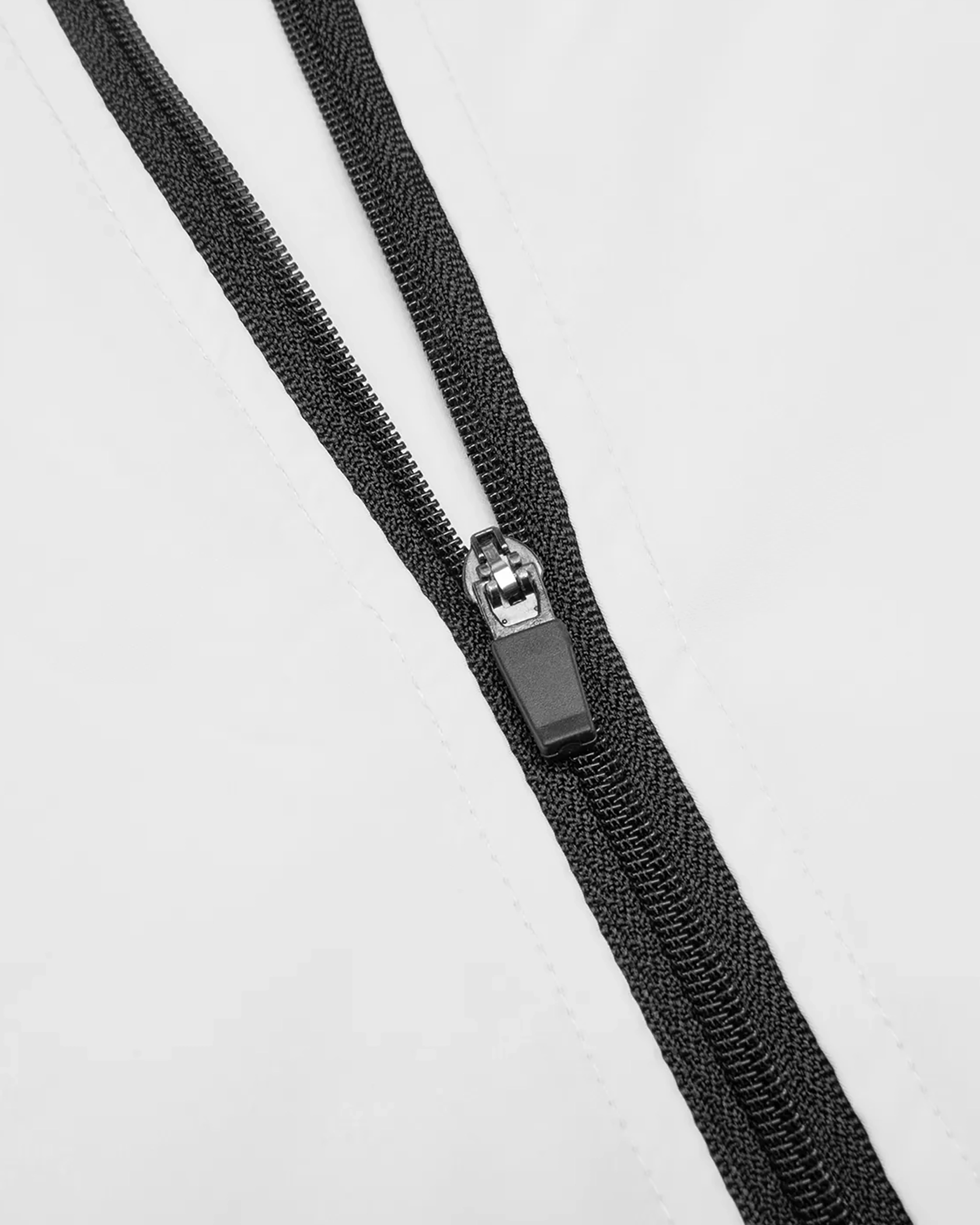 Black zip on a white background