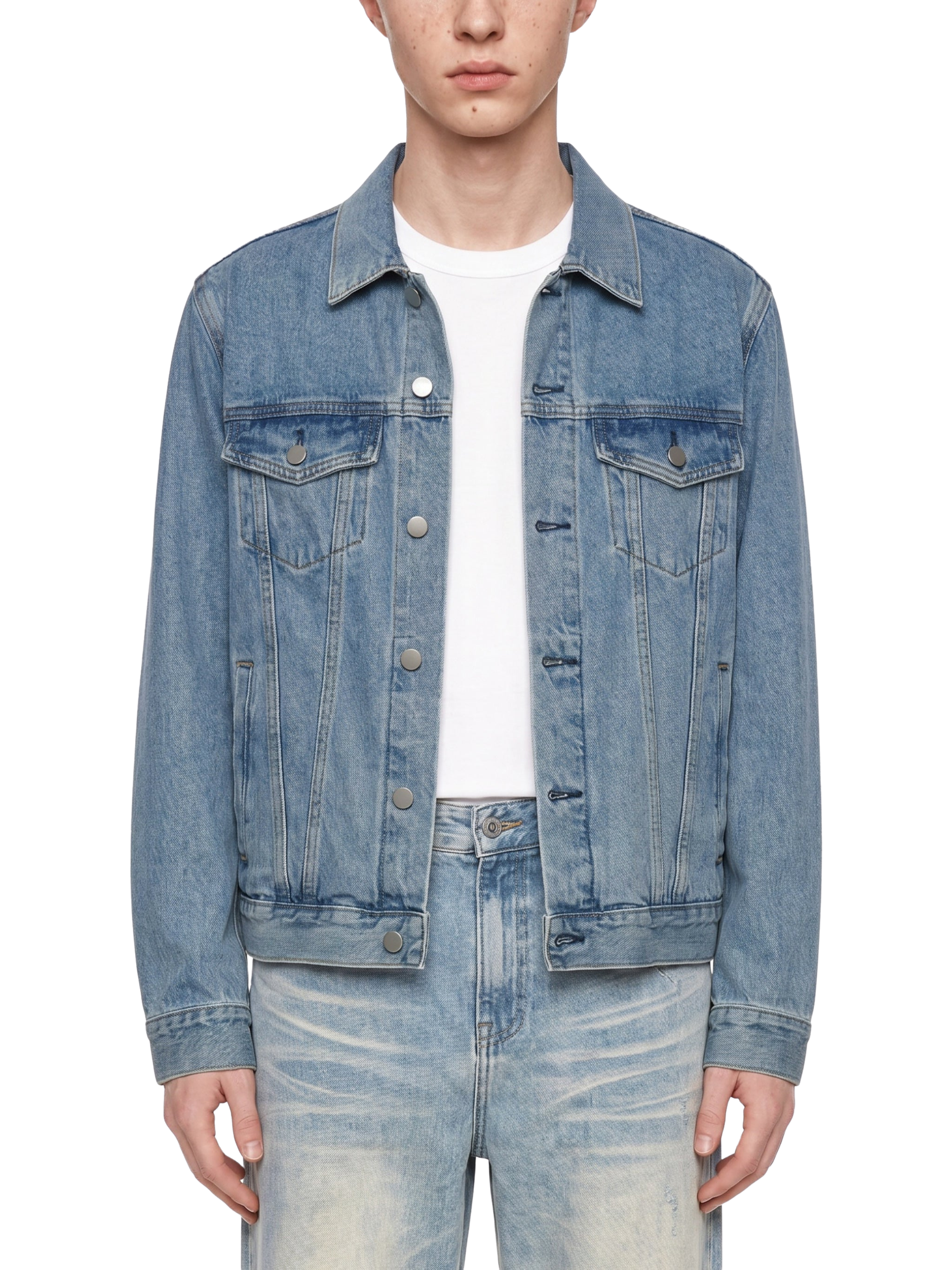 Person wearing a blue denim jacket and jeans on a white background