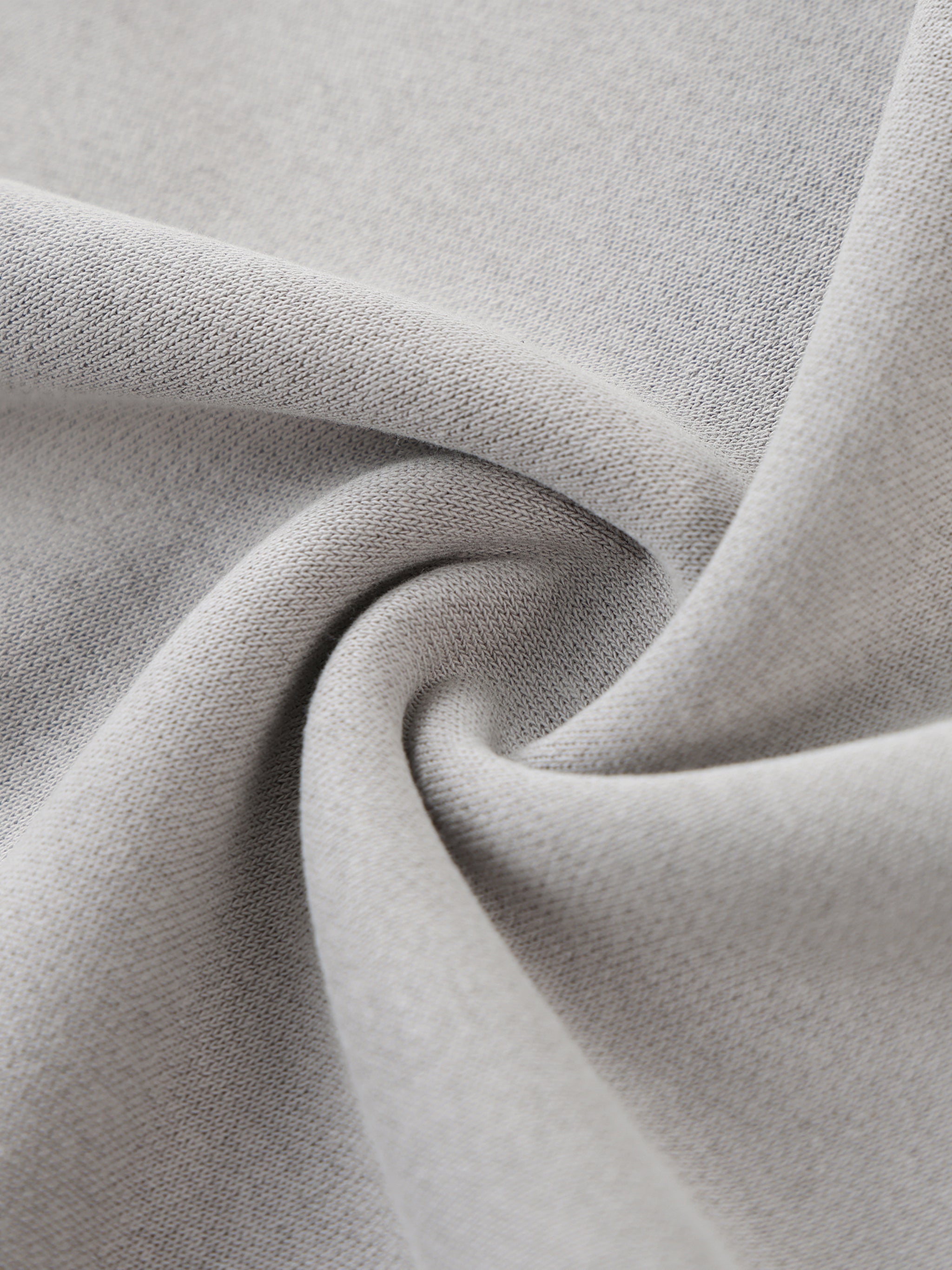 Close-up of gray fabric with a swirl pattern